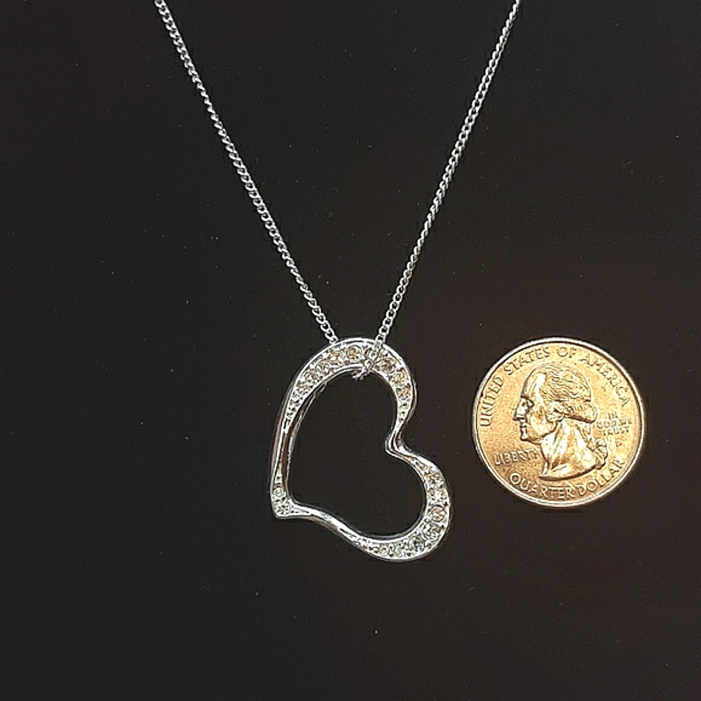 ❣️ HP ❣️AVON rhinestone heart pendant